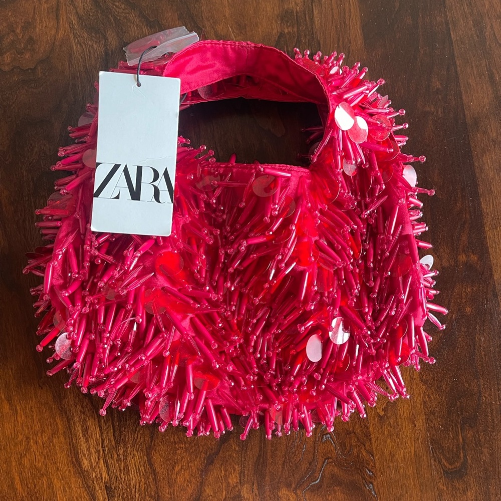 Zara beaded hobo bag. Pink/red color Magnetic snap closure, 2 inside pockets .